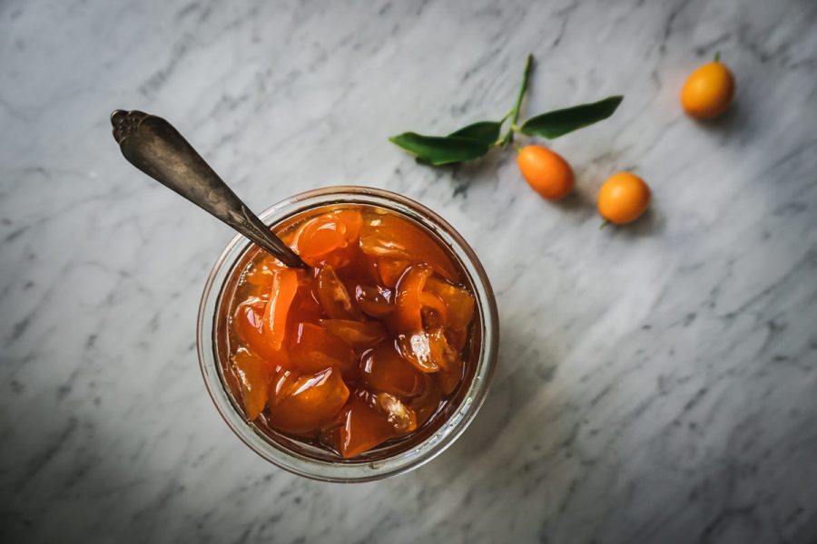Candied Kumquats in a Jar on a Counter