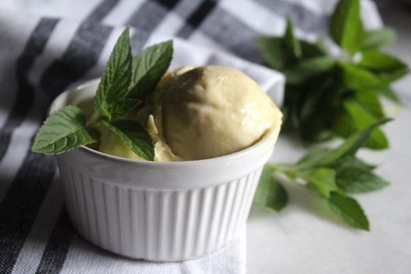 Homemade Fresh Mint Ice Cream Served in a bowl on a white marble counter