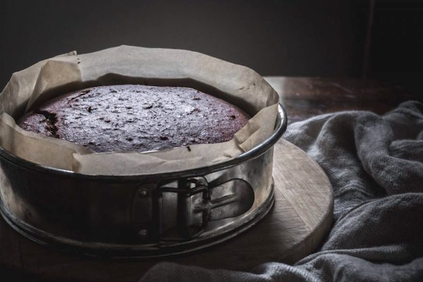 Fresh Baked Chocolate Beetroot Cake in a Spring Form Pan lined with Parchment Paper, just out of the oven.