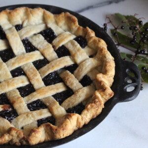 homemade elderberry pie baked with a lattice top pie crust