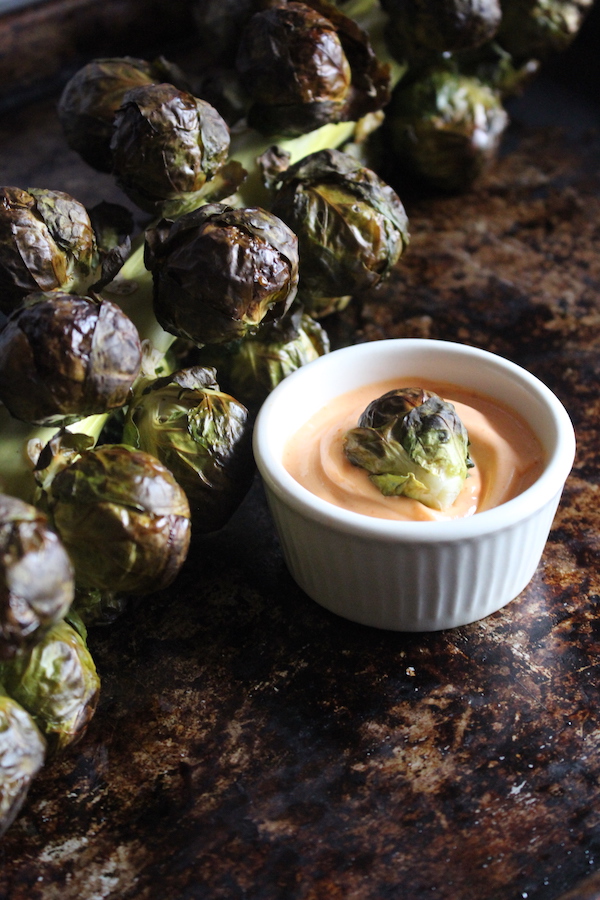 Roasted brussels sprouts on the Stalk with Sriracha aioli dipping sauce