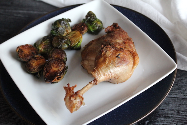 Confit de Canard Served with duck fat fried Brussels sprouts.