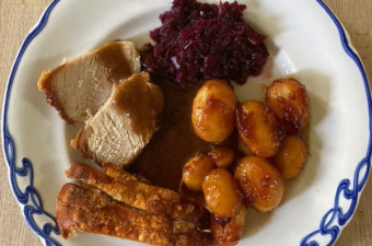 Flæskesteg served with rødkål, brown sauce, brunede kartofler and cracklings